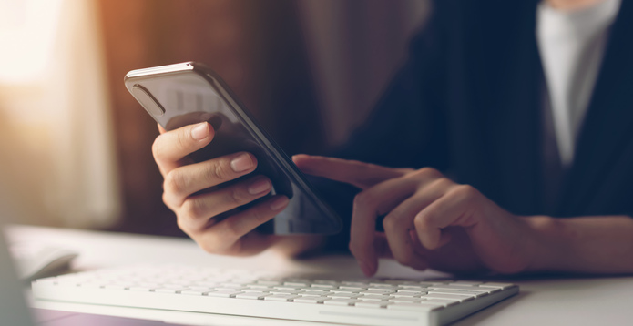 Hand using smartphone card