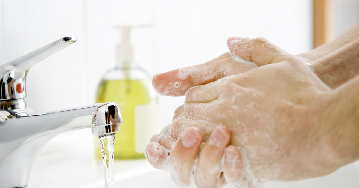 Employee washing hands