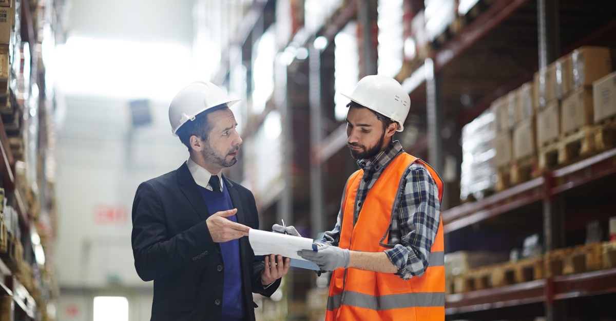 Warehouse staff in discussion